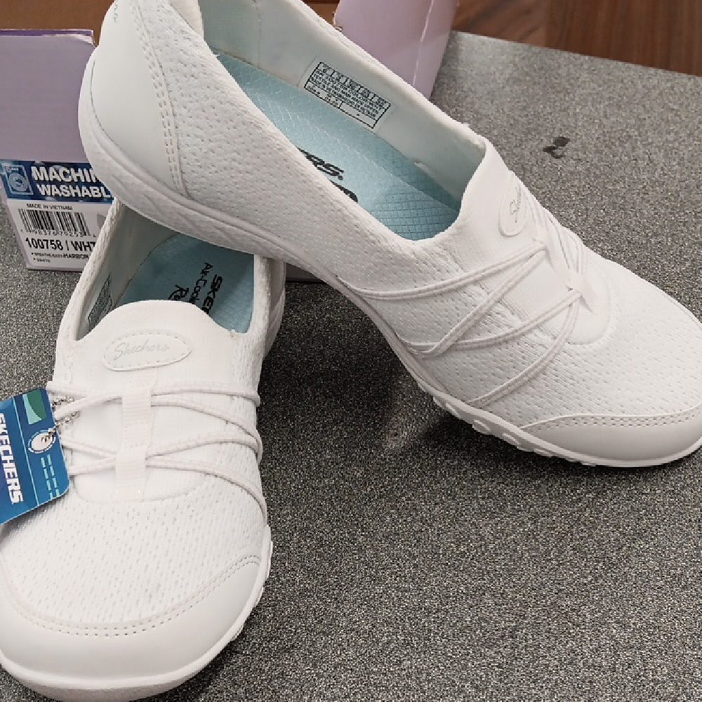 Skechers Women's White Slip-On Sneakers